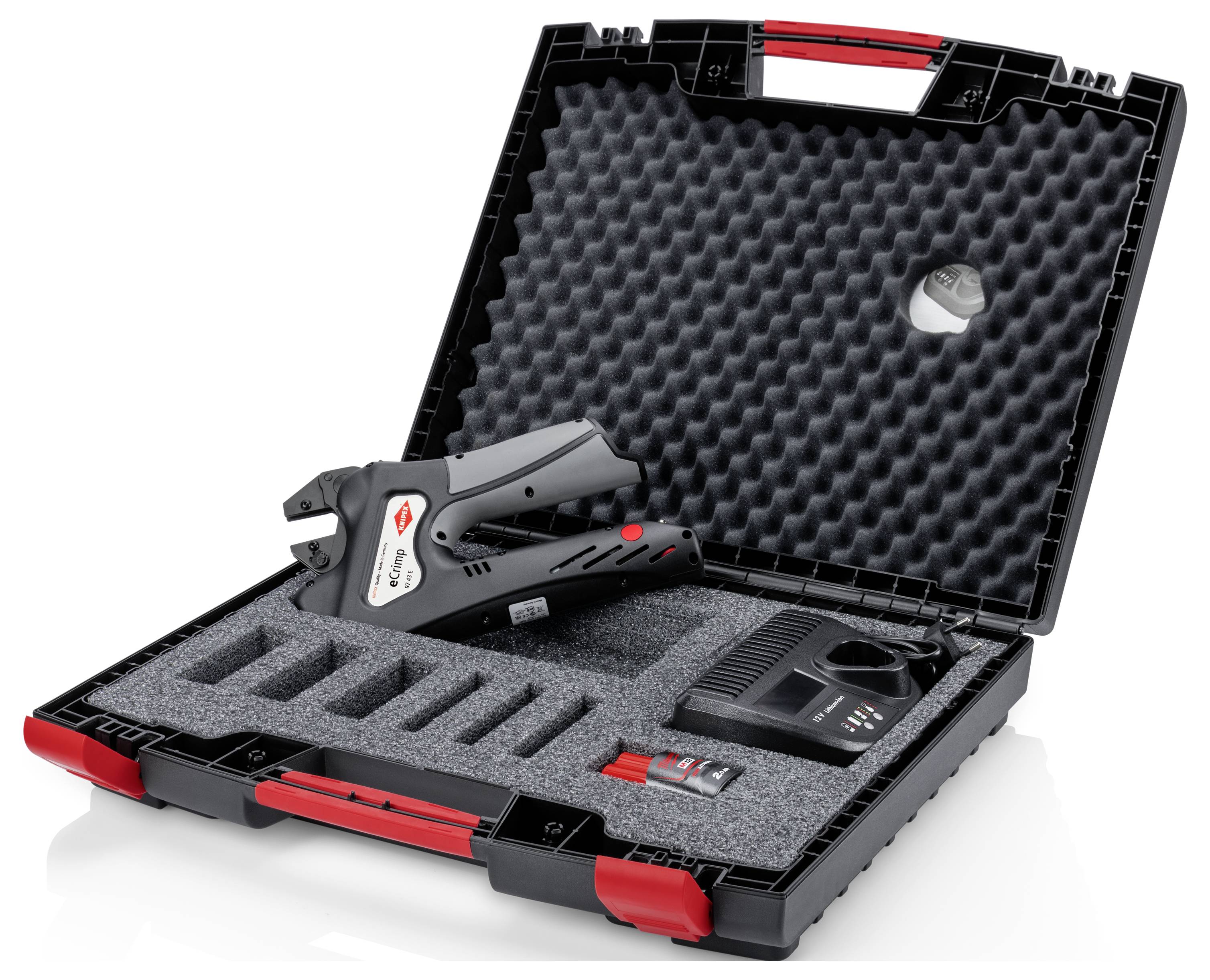 A black transport case with moulded foam inlay contains a battery-powered electric tool and accessories.