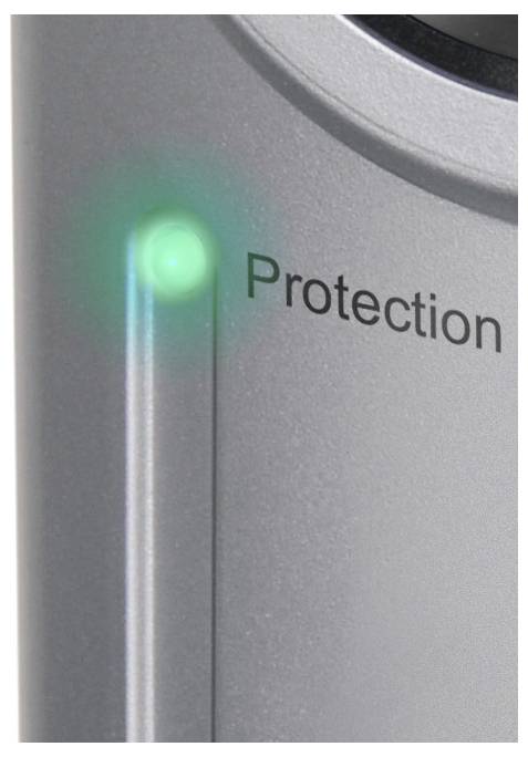 Close-up of a device panel with a glowing green indicator light beside the word 'Protection'.