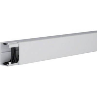 White plastic cable trunking with side opening, showing black cables, suitable for neat cable organisation on walls.