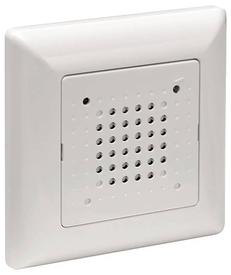 A white wall-mounted speaker or intercom with a square perforated grille at the center, typically used for audio communication.