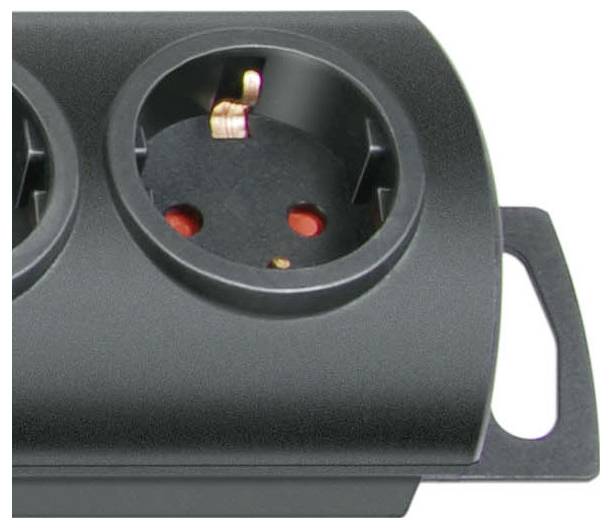 Close-up of a black electrical outlet socket with mounting bracket, showing the circular plug opening and internal contacts.
