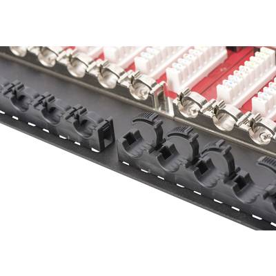 'Close-up of a technical module with cable connections and labels.'