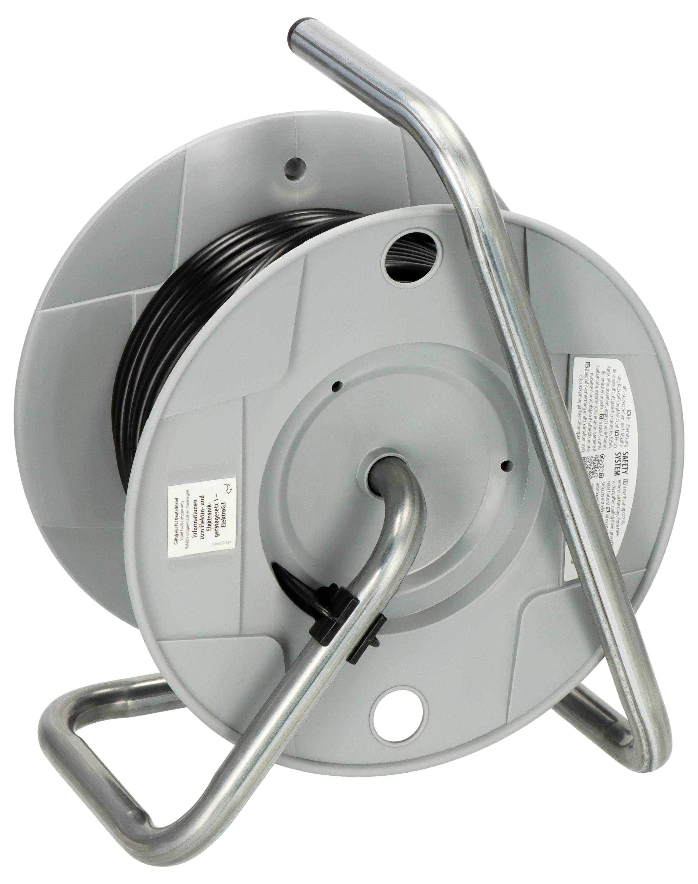 Empty plastic cable drum with steel frame for cable winding.