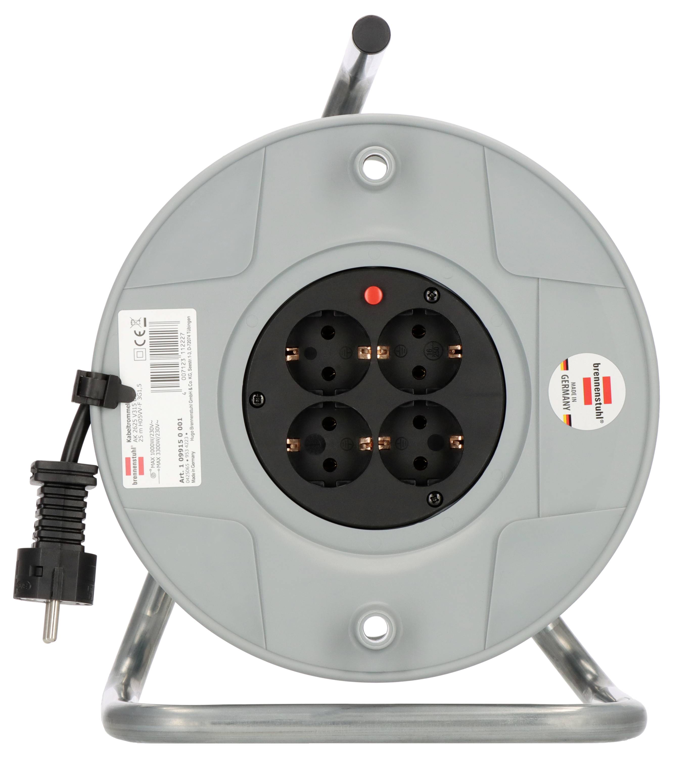 A round cable reel with four black plug sockets and a mains plug on the side.
