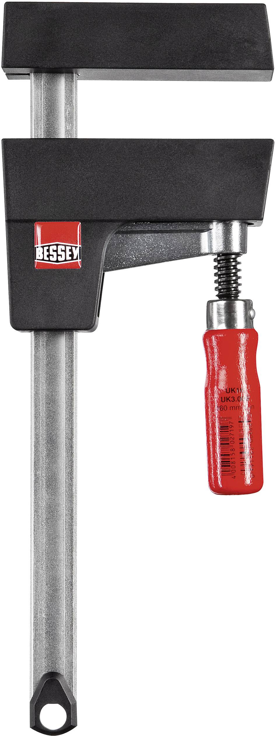 A black G-clamp with a red handle, which reads 'Bessey', used for securing workpieces.