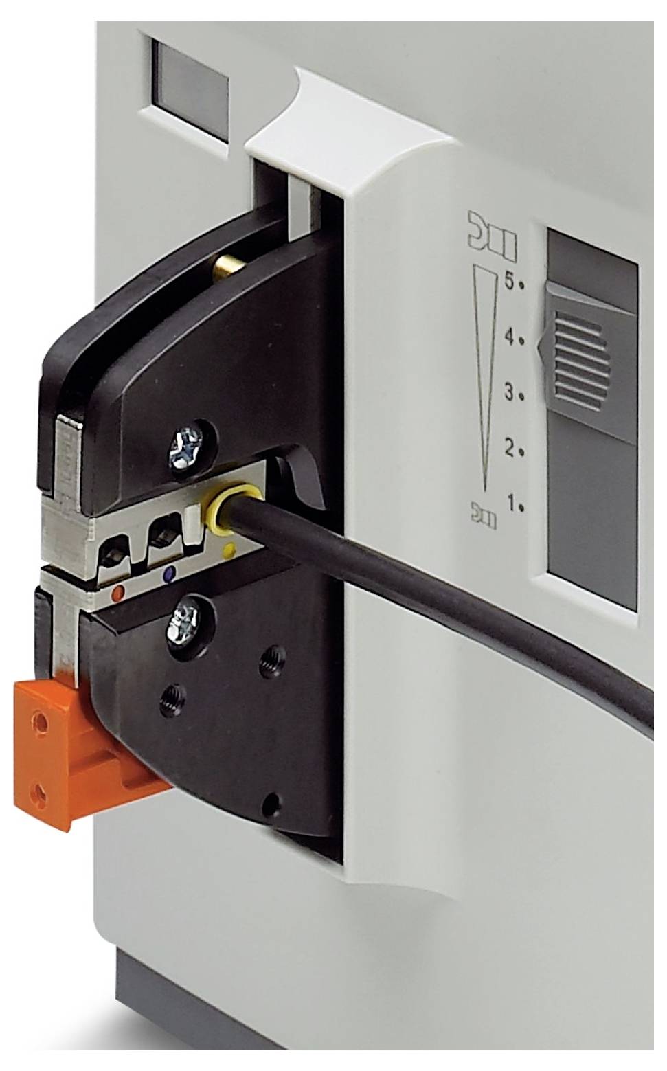 A close-up of an electric crimping tool in use, with a wire being crimped, showing precise alignment and crimp indicator gauge.