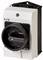 White electric main switch with a black rotary knob and the inscription 'Eaton'. Switch is in the 'Off' position.