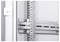 'Close-up of a rail system on a white wall supporting metal shelving. Distinct screws and mounting brackets clearly visible.'