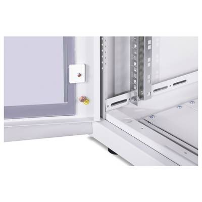 An open, empty metal electrical cabinet shows part of the door with a white box and colourful buttons on the left side.