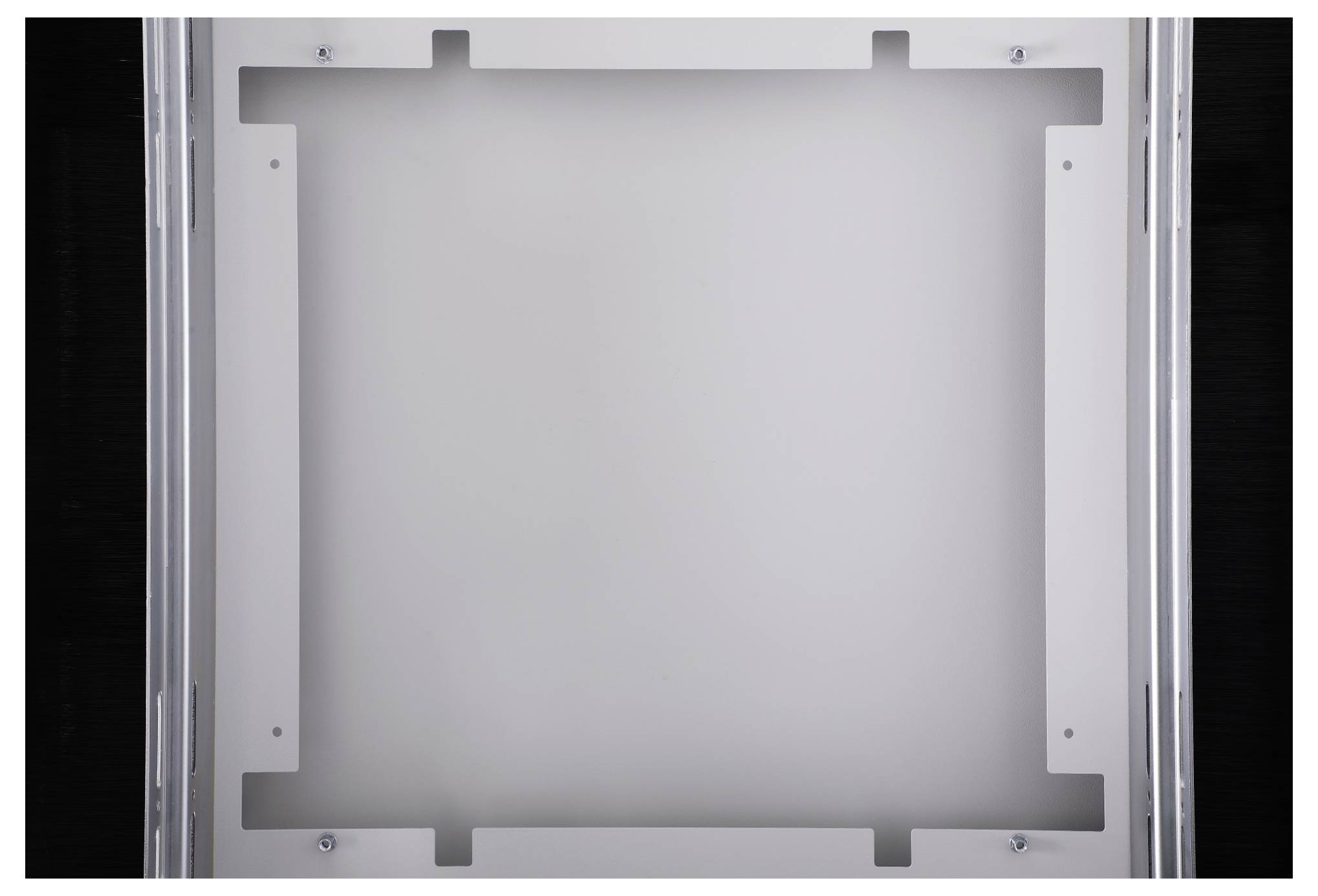 A square, empty metal frame, viewed from above.