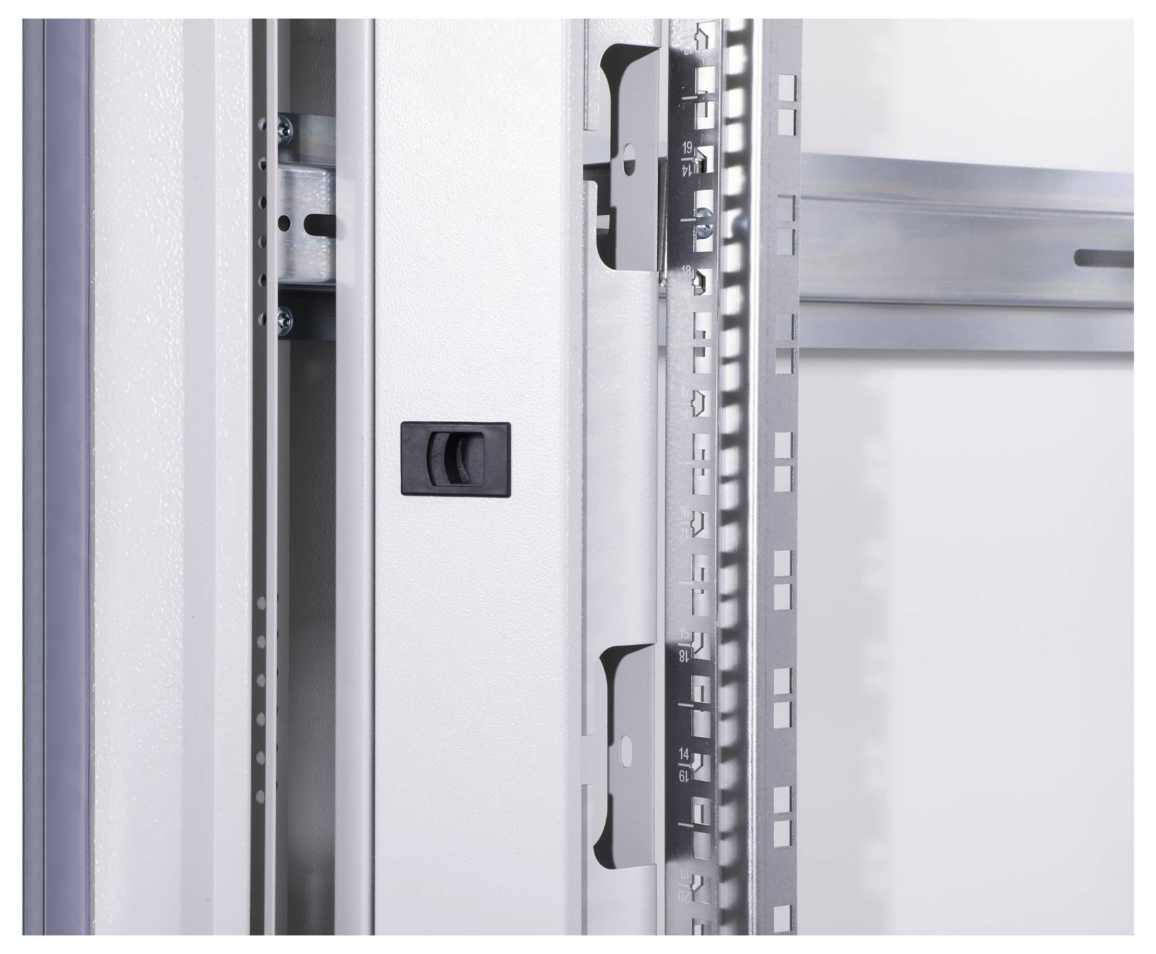 Metal cabinet with an open door frame, showing an internal view of the structural bracing and mounting elements.