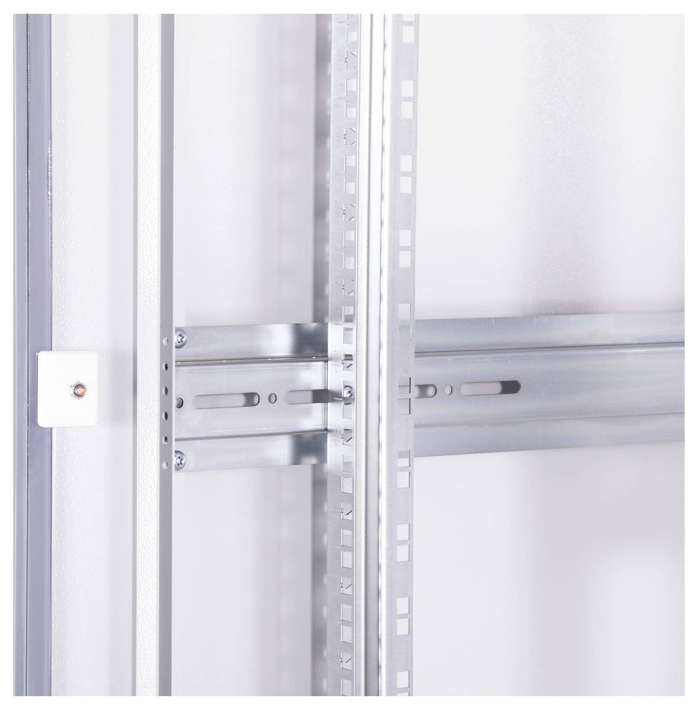 Metal frame of a cabinet with sliding door mechanism, including guide rails and fixings.