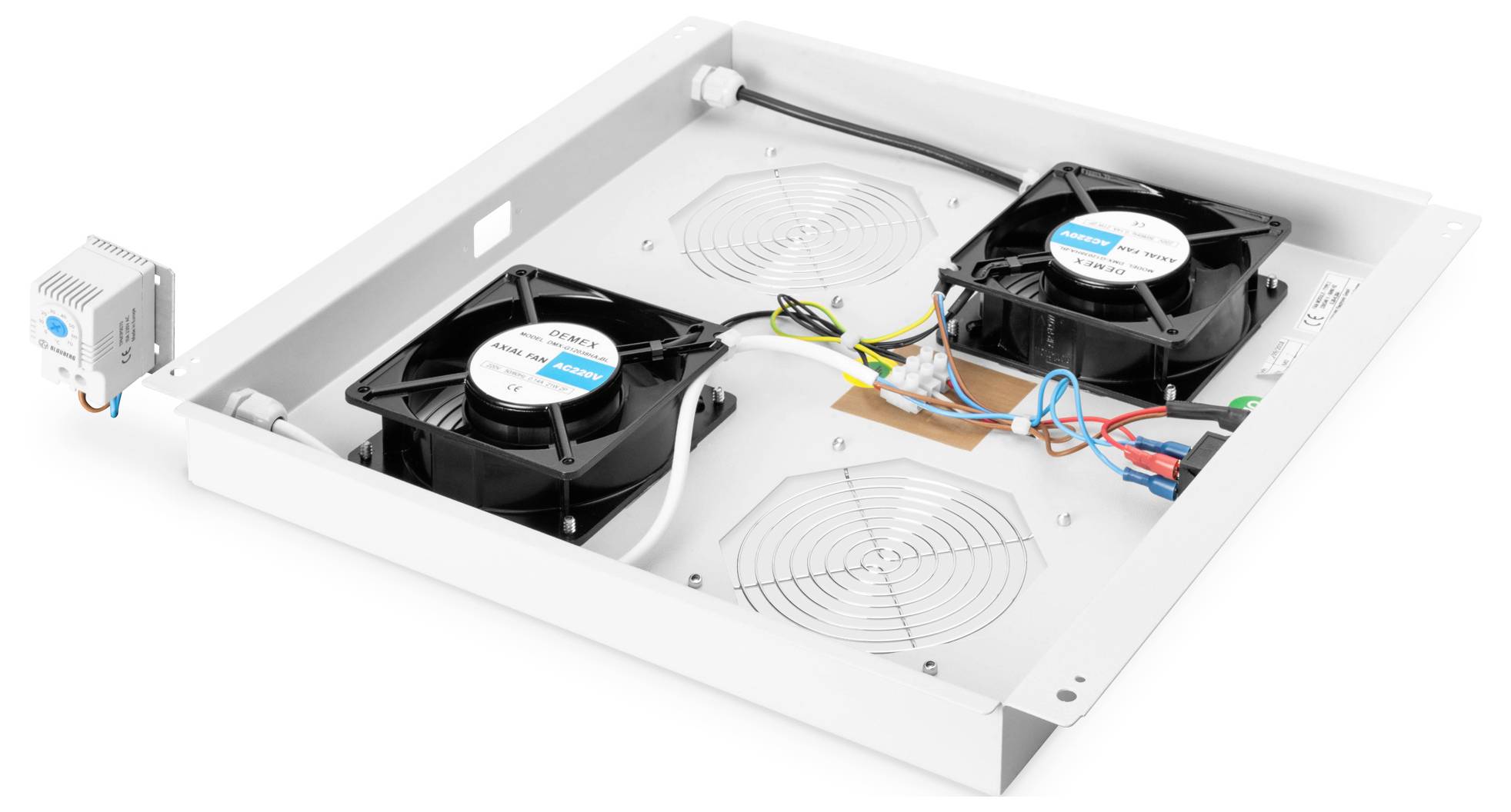 'A white ventilation unit with two black electric fans and wiring on a rectangular metal surface.'