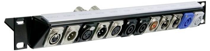 An array of various audio and video panel connectors in a metal rack, featuring multiple XLR ports and color-coded sockets.