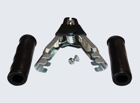 'Handlebar grip installation tool with two black grips and screws, set on a plain gray background.'