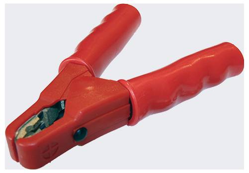 A red battery clamp with textured handles and metal teeth, used for connecting to a car battery, is shown against a plain background.