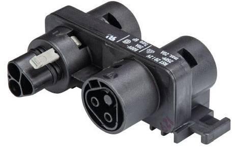 A black three-pin plug adapter for electrical connections, positioned sideways and printed with technical markings.