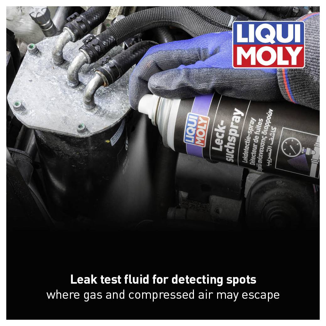 A gloved hand is holding a can of leak detection spray from LIQUI MOLY, which is aimed at an engine. Text: 'Leak detection liquid for locating leaks in gas and compressed air systems'.