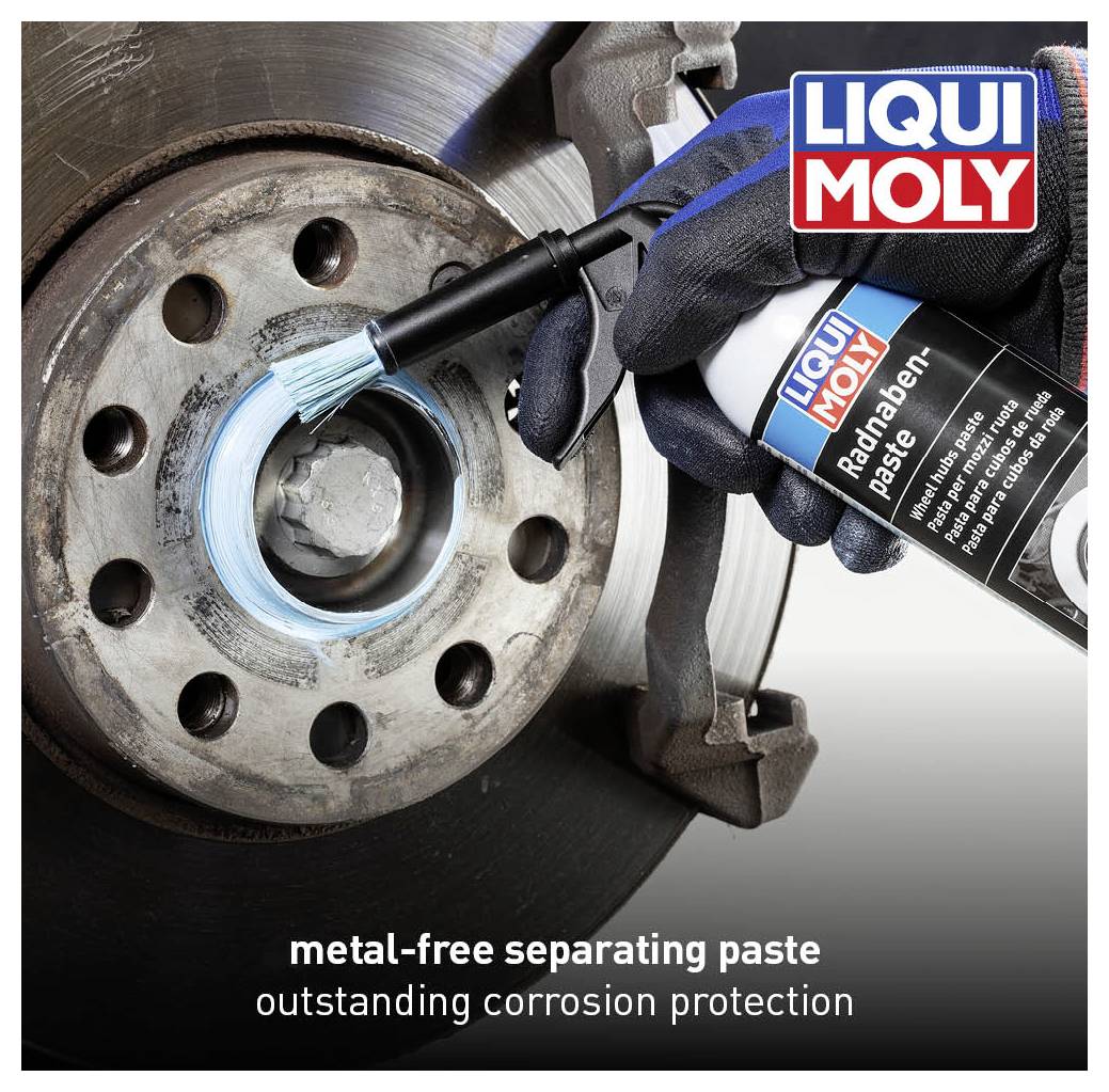 A person applies metal-free separating paste to a brake disc using a brush. The Liqui Moly logo is shown in the top right. Text: 'metal-free separating paste outstanding corrosion protection'.