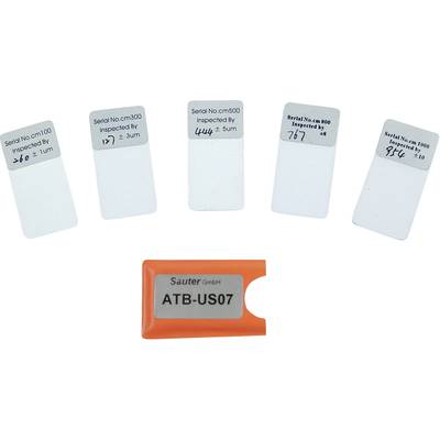 Five test cards with different serial numbers and measurement values, next to an orange device labelled 'ATB-US07'.