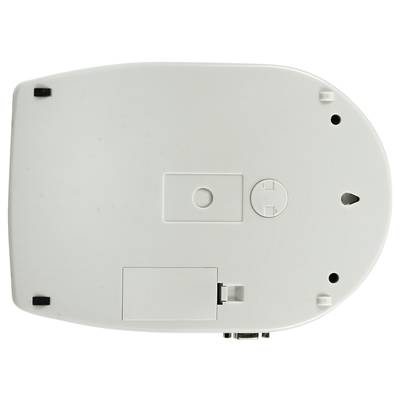 The underside of a white electronic device with ports and battery compartment, unseen from this perspective.