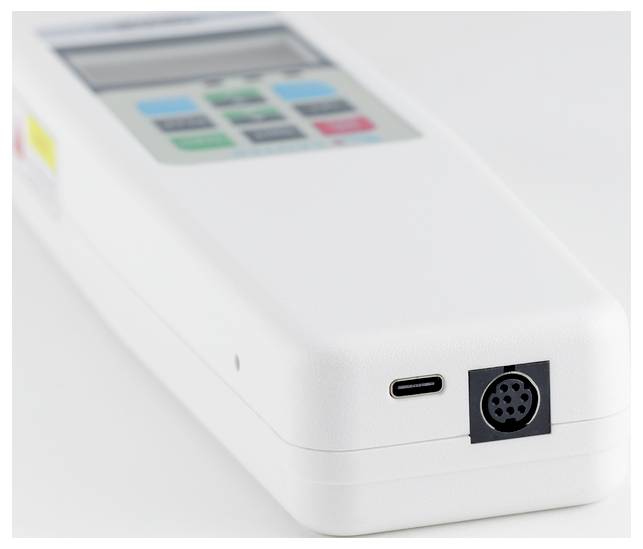 A white, portable device with a display and colourful buttons. It has ports on the underside and appears to be a measuring instrument.