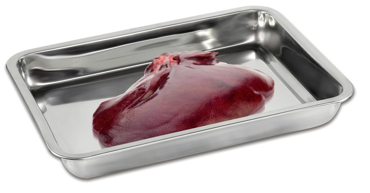 A raw piece of beef liver lies on a metallic tray.