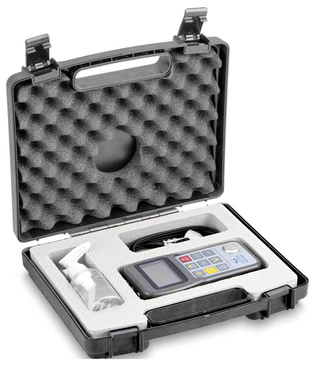 An open black case with a foam insert displays a handheld measuring device and a hinged lid in the top left corner.