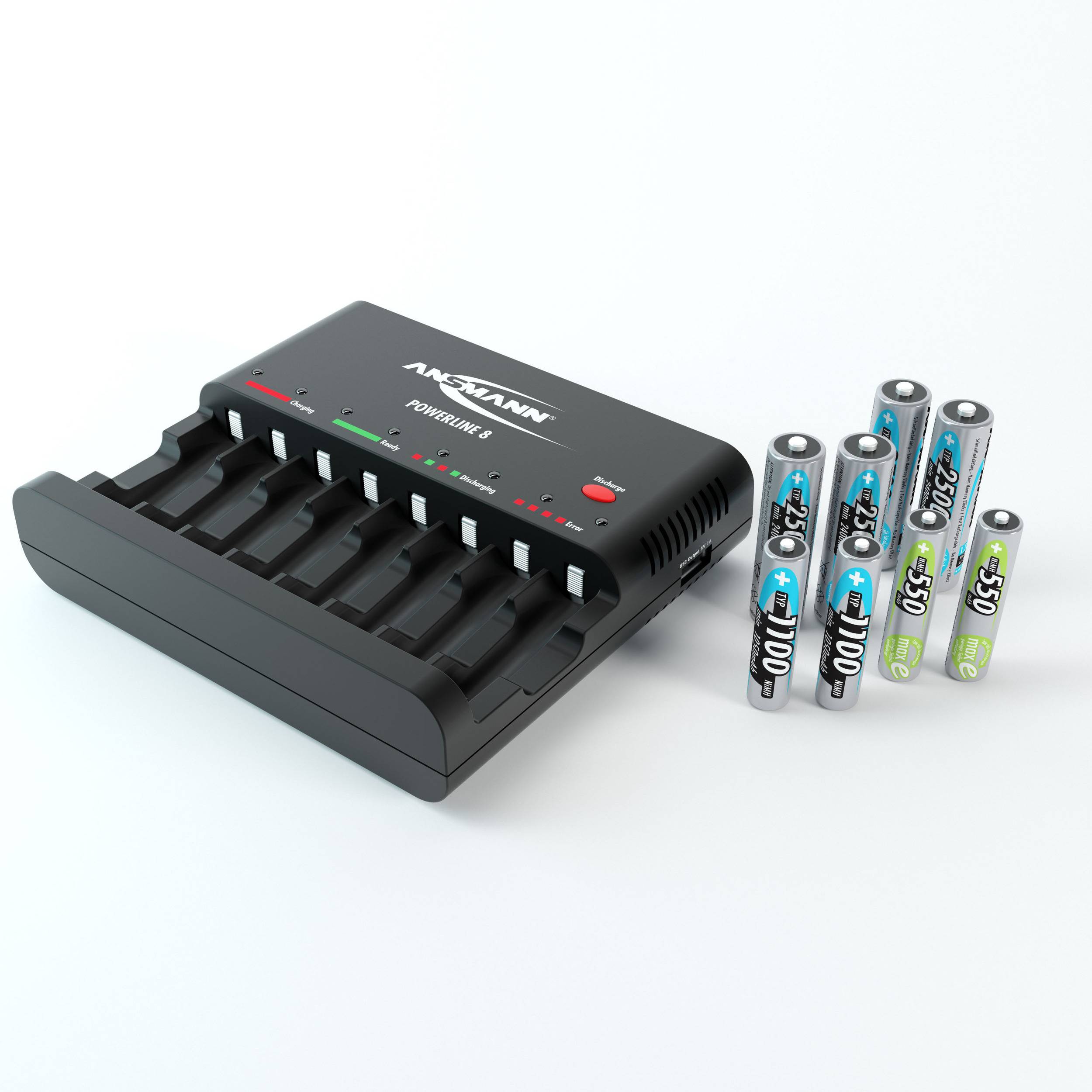 A battery charger next to charged and empty AA and AAA batteries.