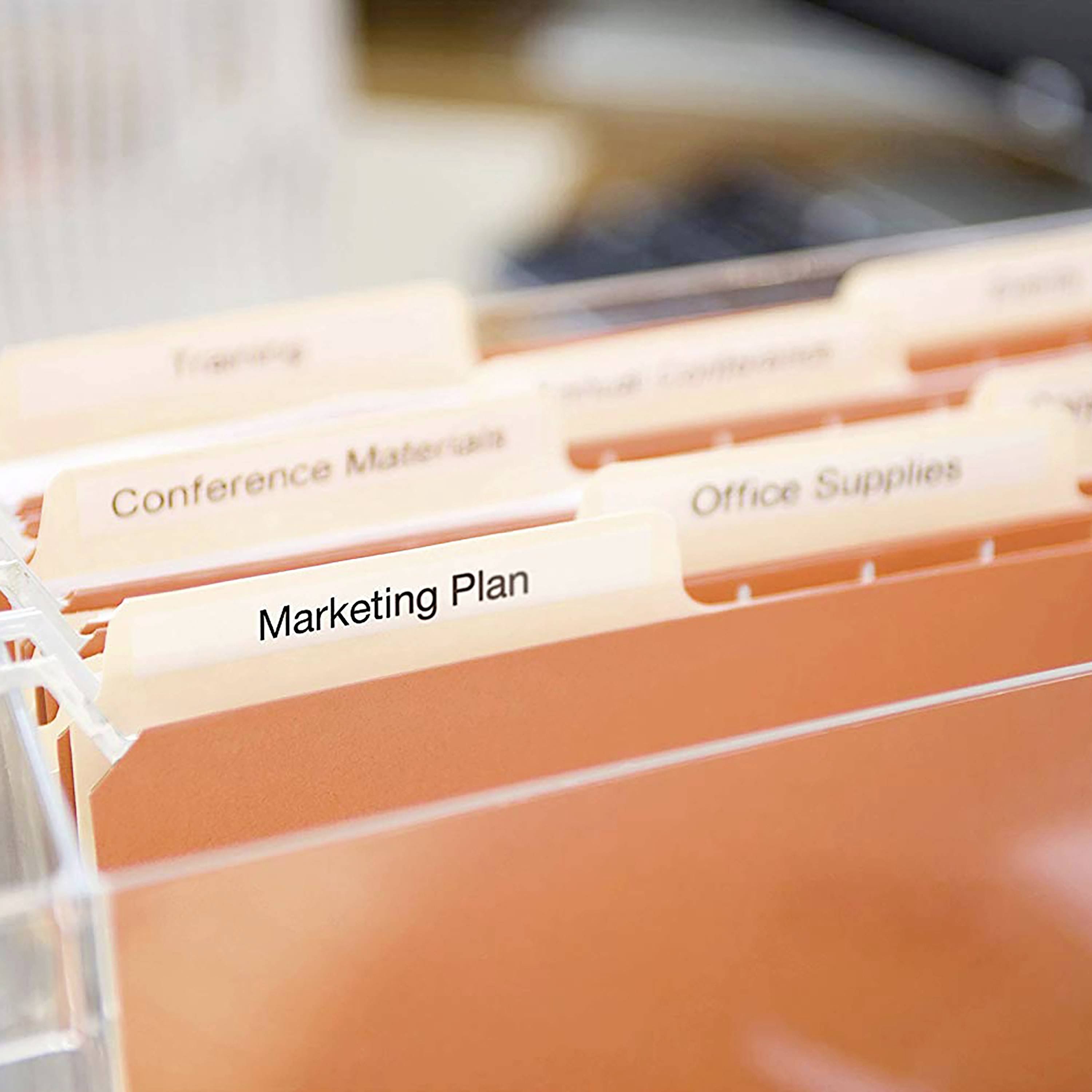 File folder with divider tabs in a filing basket. A highlighted tab is labelled 'Marketing Plan'.