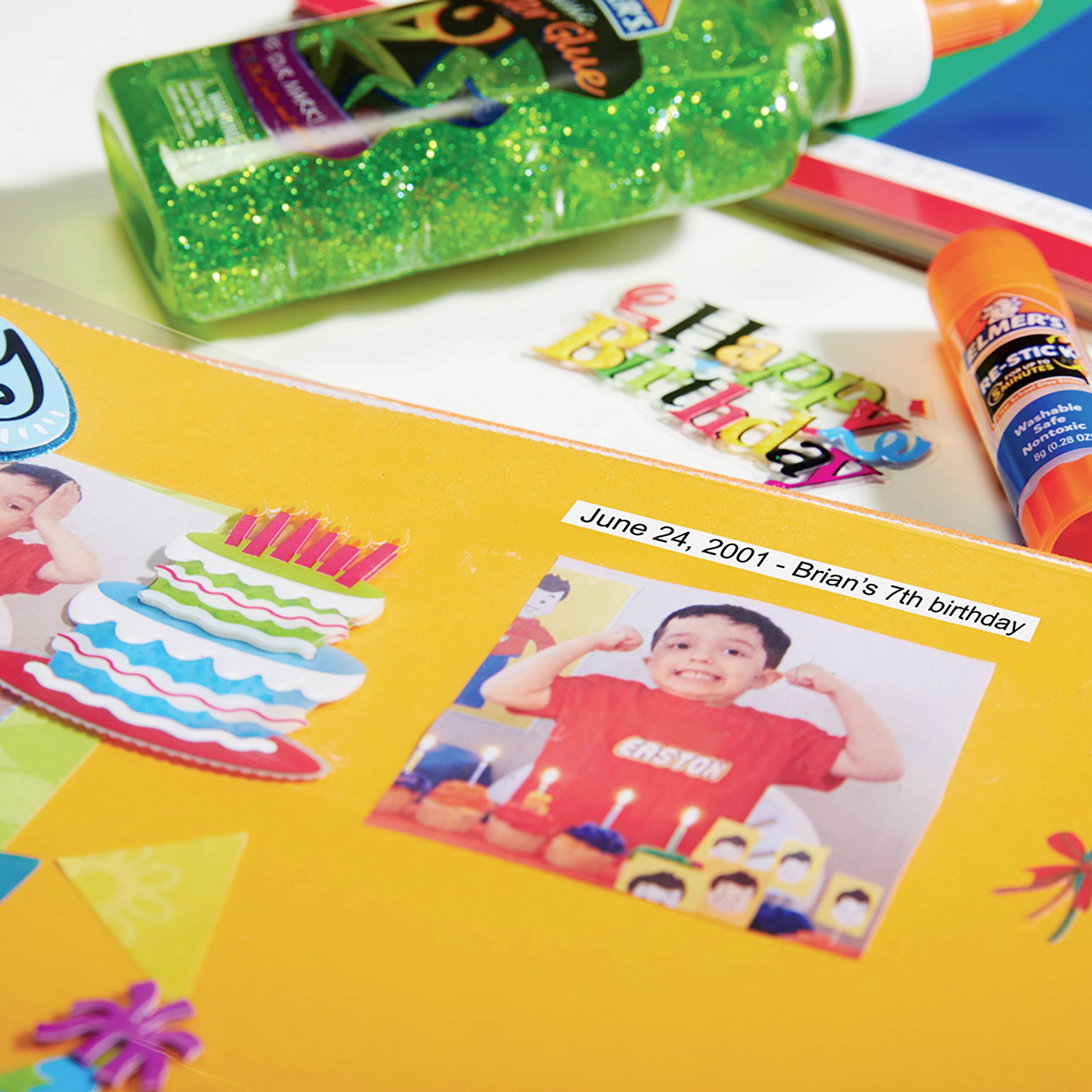 A colourful birthday album with photos and stickers, including an image of a boy in a red shirt with the inscription 'Gaston' and the date 24th June 2001.