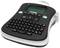 Electronic label printer with keyboard and display, with the text 'LM2100X' visible on a paper strip.
