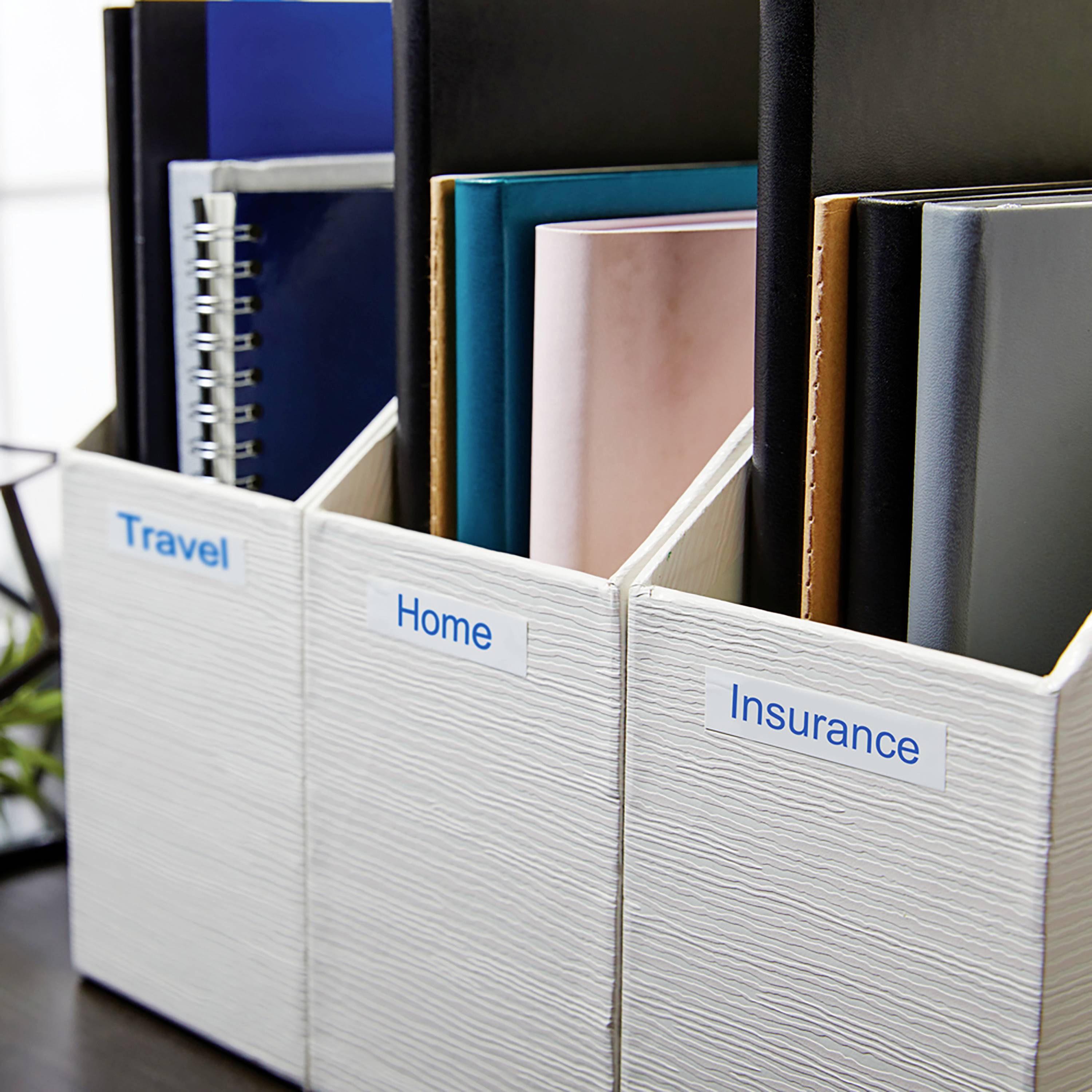 Folders with labels: 'Travel', 'Home', 'Insurance'. Contains various bound documents that are organised and easily accessible.