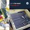 'Employee processing fish while wearing red gloves; fish crate on the right. Text on image: profibreed, FishGrid, FIBF logo.'