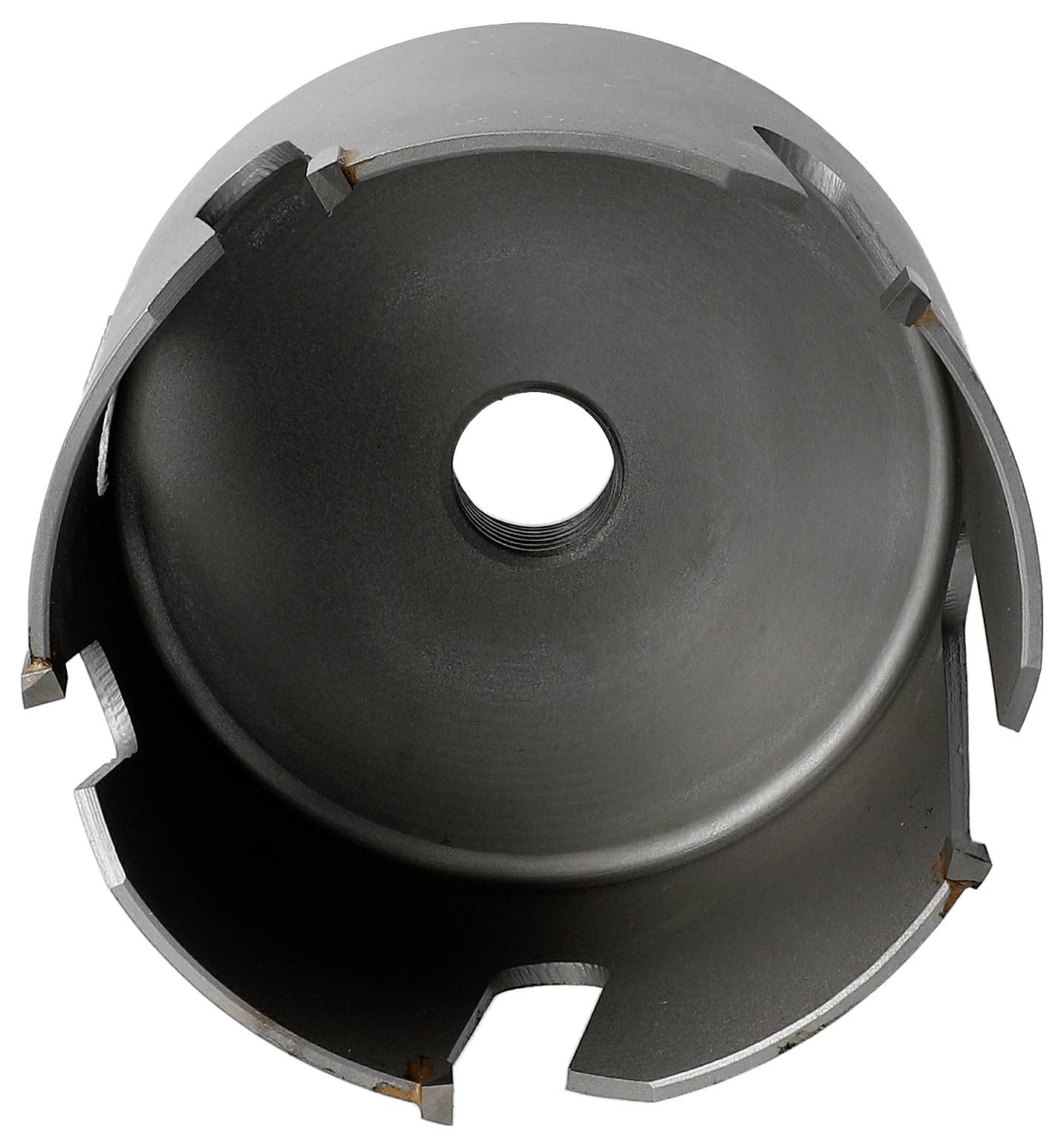 Top view of a black metal hole saw cutter with a central pilot hole and cutting teeth around the rim on a white background.
