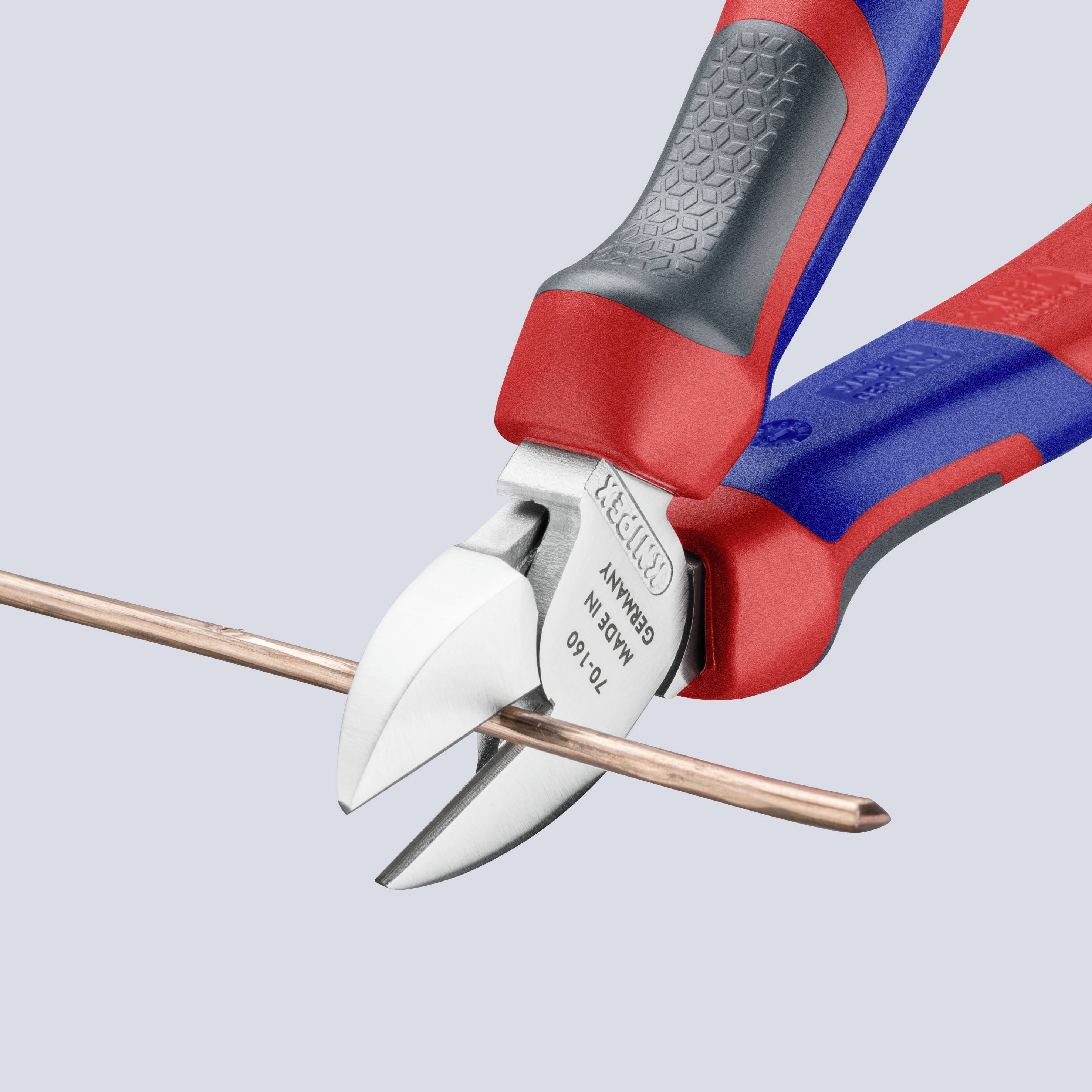 A pair of pliers cuts through a copper wire. The tool has a red and blue handle and a shiny metal blade.