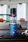 'A can of Caramba Power Bremsen & Teile Reiniger' brake cleaner is on a workbench, with a car visible in the blurred background.
