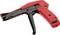 A red and black cable tie gun, used for tightening and cutting cable ties, shown against a plain white background.