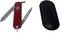 A red Swiss Army knife with an unfolded blade and nail file, next to a black case.