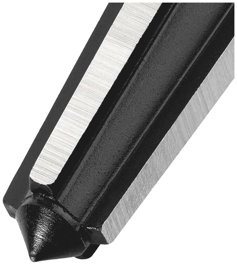 Close-up of a black metal point with faceted edges; likely part of a tool or machine component.