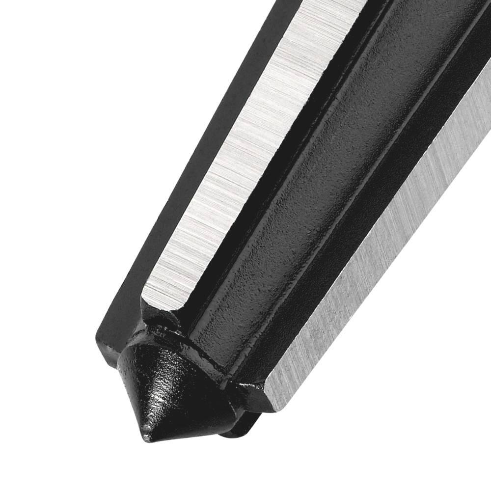 Close-up of a metallic cross chisel with sharpened edges, used for precise cutting of materials.