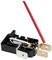 An electrical switch with metal contacts on a black base, alongside a red plastic tool for operating the switch.