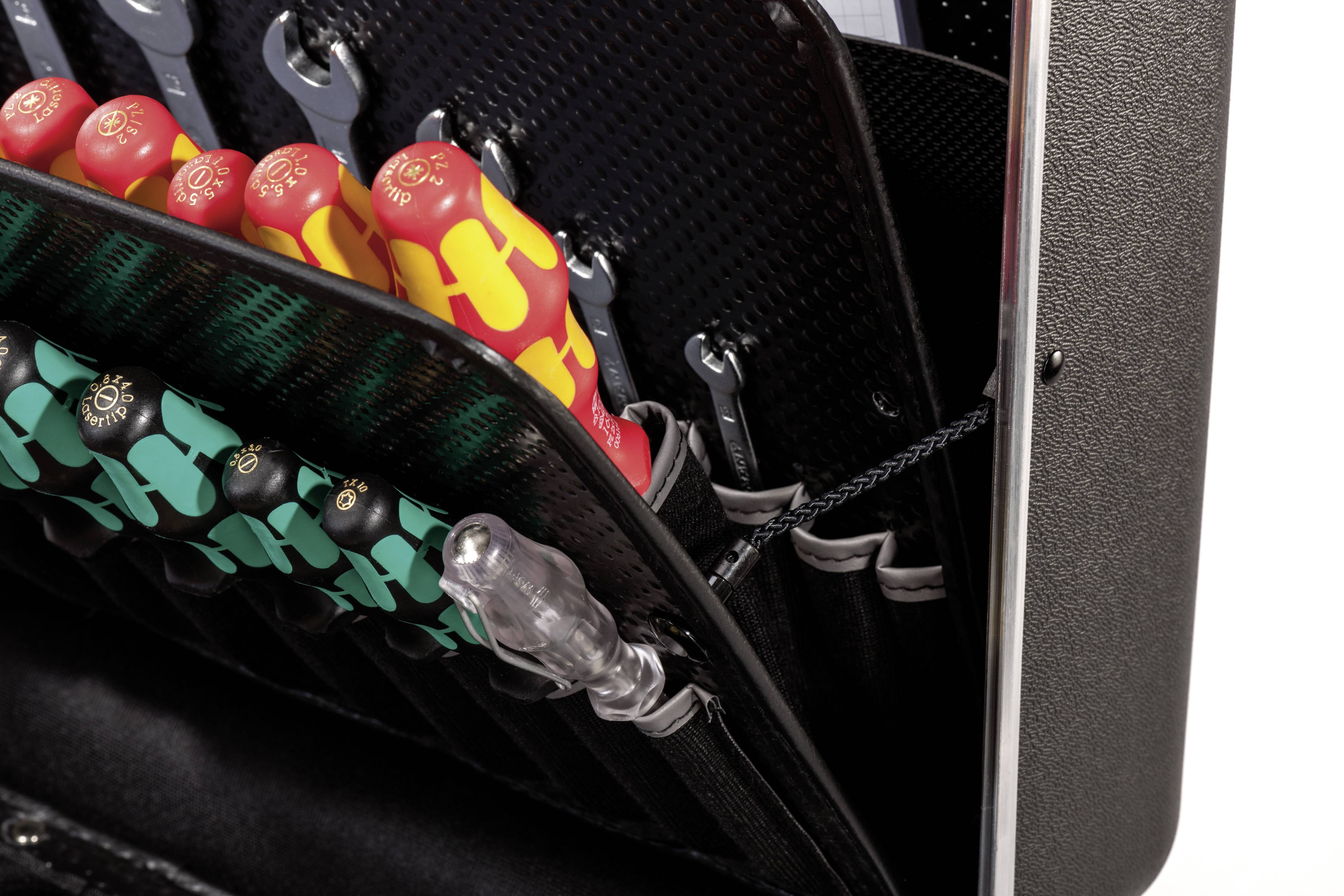 An open toolbox displays sorted screwdrivers and spanners in various colours and sizes.