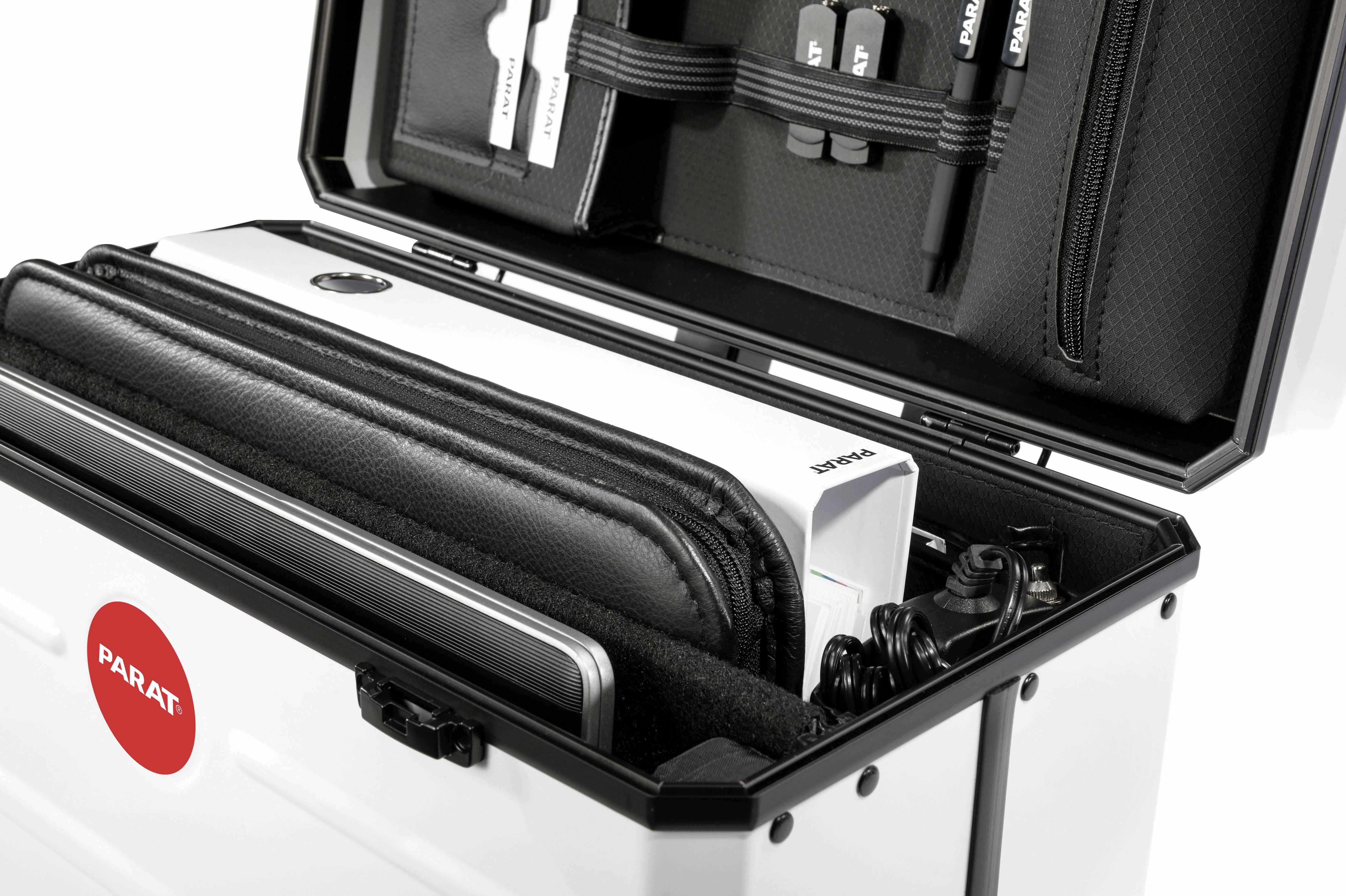 An open toolbox displays various tools and devices neatly stored. A red logo with the inscription 'PARAT' is visible.