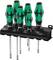 Screwdriver set consisting of six screwdrivers with ergonomic handles, wall-mounted in a holder.