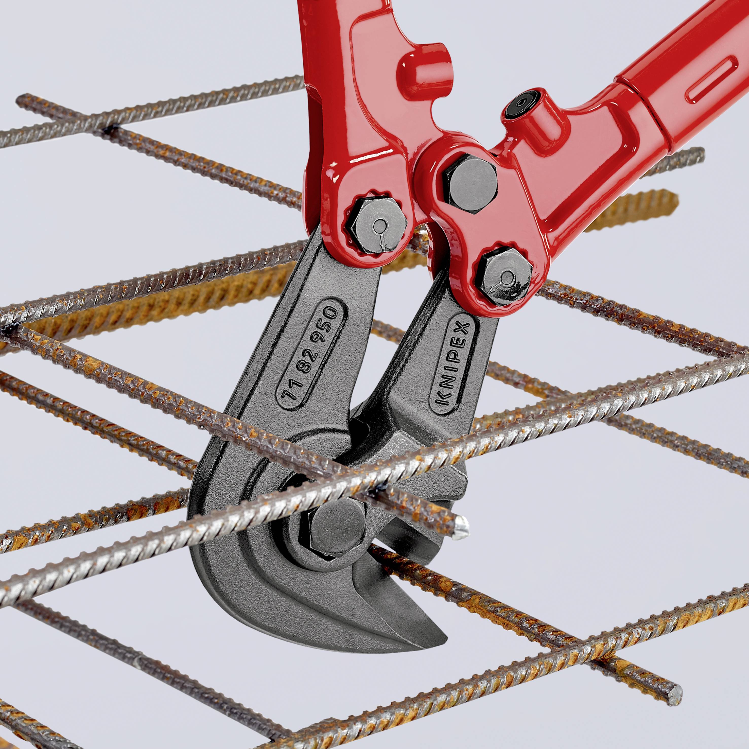 A red bolt cutter cuts through a reinforcing steel bar arranged in a lattice pattern.