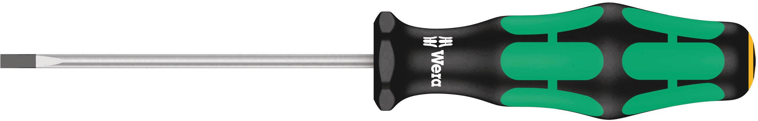 A flat-head screwdriver with a black and green ergonomic handle, suitable for electrical work.