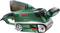 A green Bosch belt sander with a red power button and black handle. Device for sanding surfaces.
