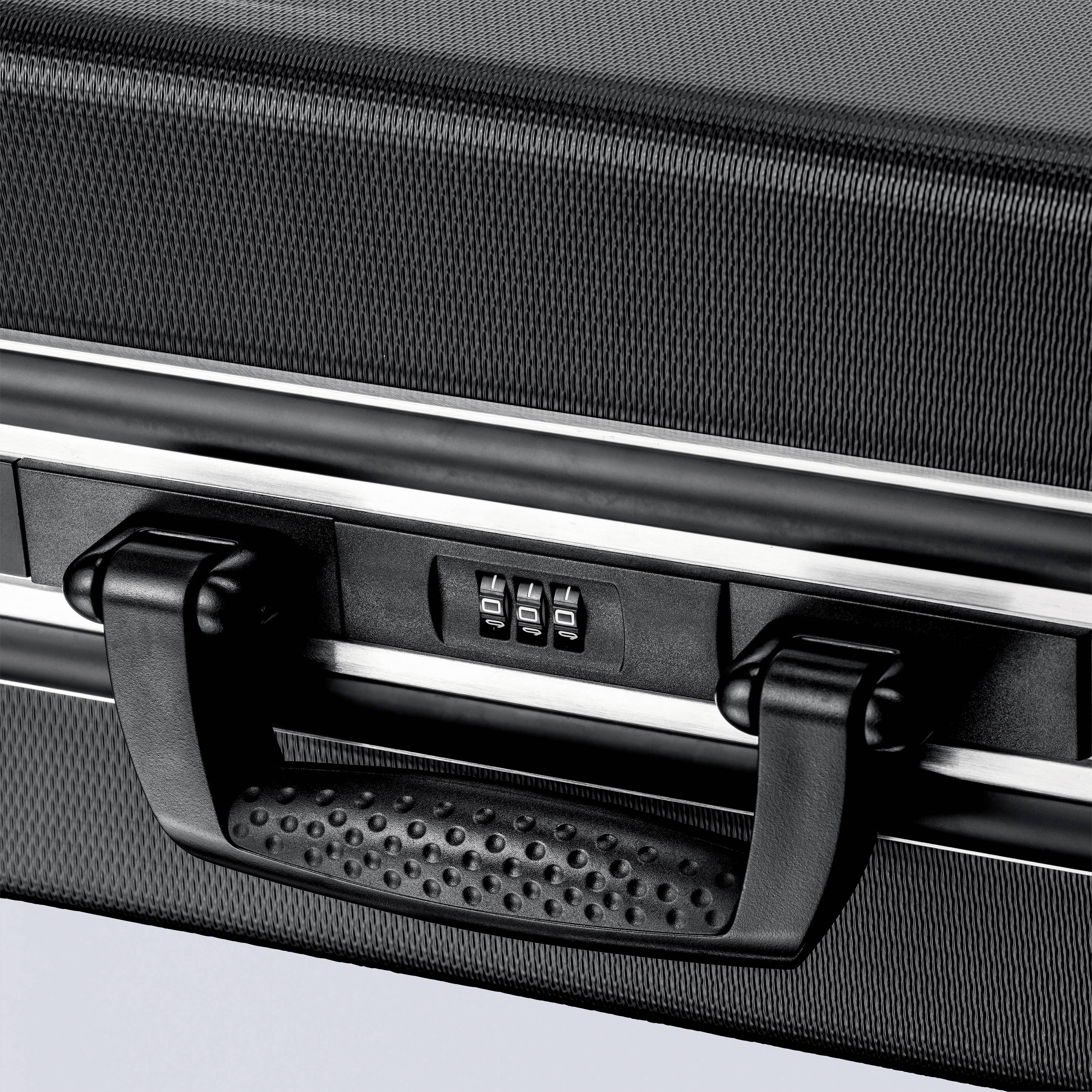 A black suitcase with a combination lock, secure latches, and an embossed handle for safe transportation.