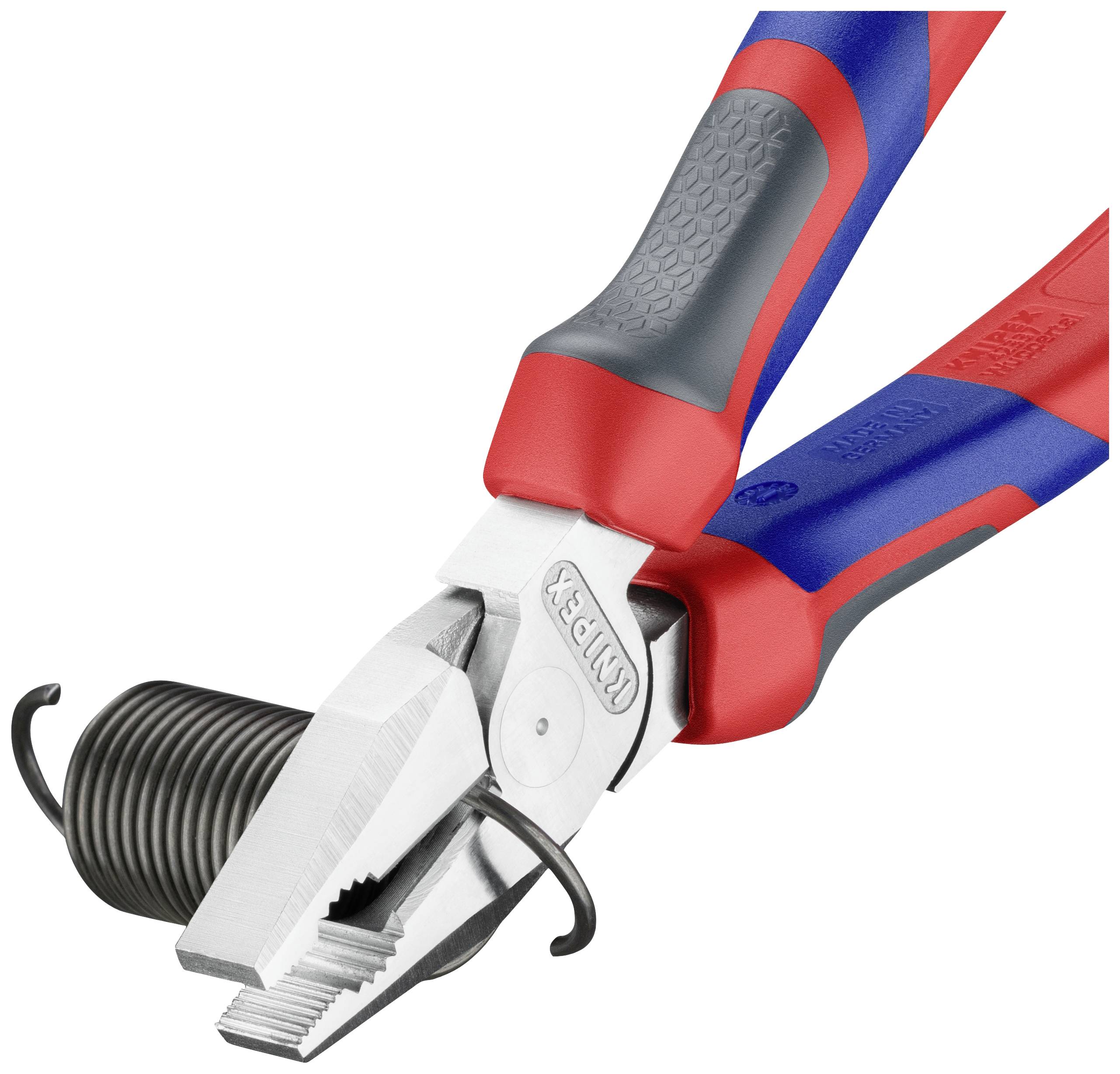 A combination pliers holds a coiled wire. Handles in red and blue with ergonomic design.